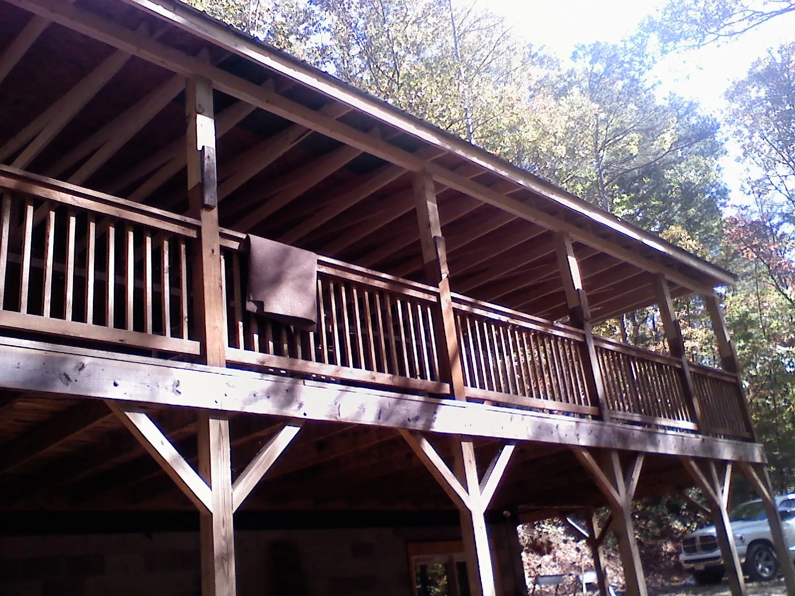 Timber framing under a new elevated porch and deck — Roof Leak Repair in Silver Lake by Roofing Brothers